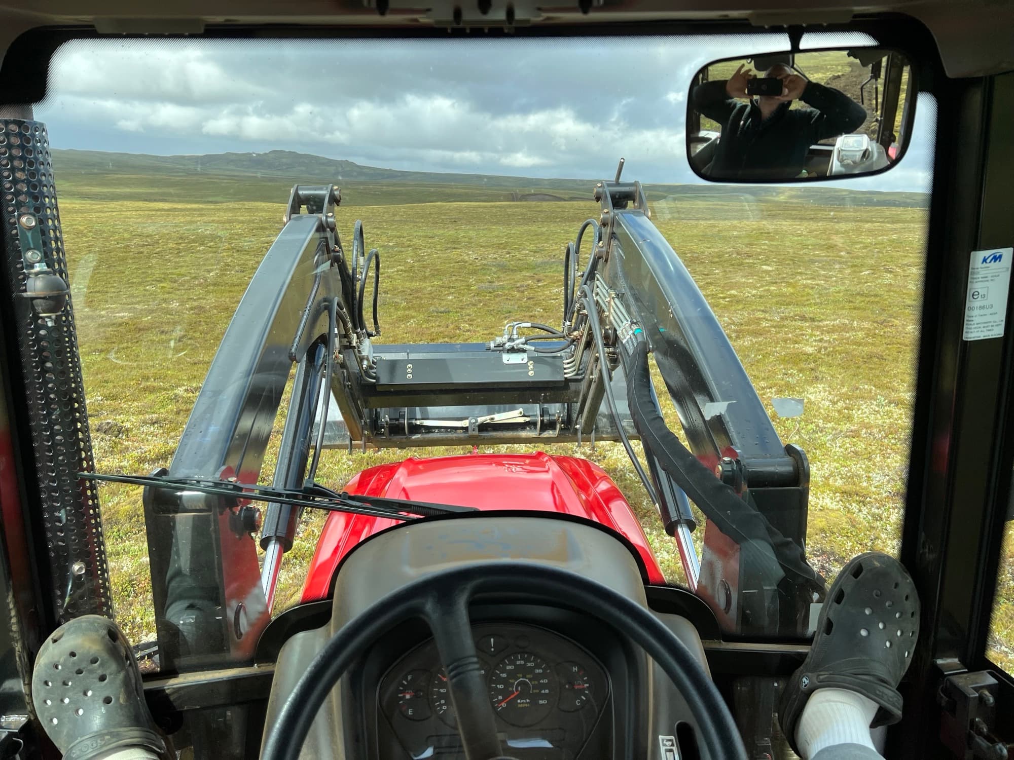 View from the tractor cab during soil preparation